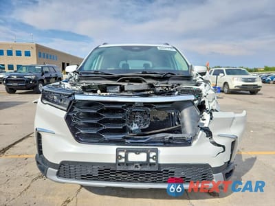Piąte zdjęcie samochodu w środku: 2023 HONDA PILOT ELITE VIN:5FNYG1H81PB001510 - miniatura