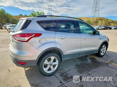 Trzecie zdjęcie samochodu z tyłu: 2014 FORD ESCAPE SE VIN:1FMCU0GX1EUB85935 - miniatura
