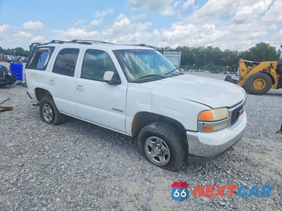 Czwarte zdjęcie samochodu z boku: 2002 GMC YUKON VIN:1GKEC13Z92R245864 - miniatura
