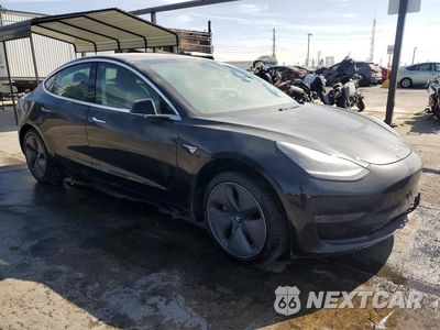 Czwarte zdjęcie samochodu z boku: 2020 TESLA MODEL 3 VIN:5YJ3E1EA9LF739069 - miniatura
