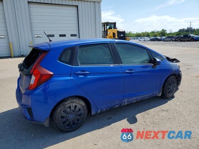 Trzecie zdjęcie samochodu z tyłu: 2015 HONDA FIT LX VIN:3HGGK5H50FM714160 - miniatura