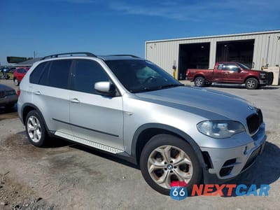 Czwarte zdjęcie samochodu z boku: 2012 BMW X5 XDRIVE50I VIN:5UXZV8C53CL426300 - miniatura