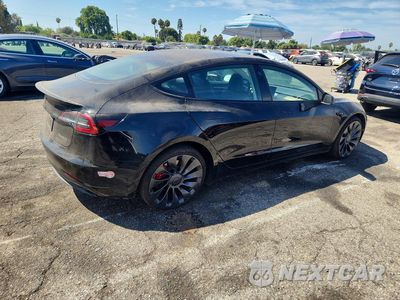 Trzecie zdjęcie samochodu z tyłu: 2023 TESLA MODEL 3 VIN:5YJ3E1ECXPF679617 - miniatura