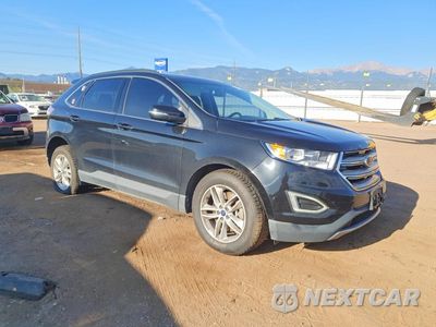 Czwarte zdjęcie samochodu z boku: 2015 FORD EDGE SEL VIN:2FMTK4J98FBB42191 - miniatura