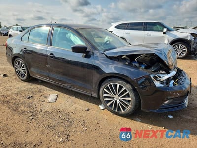 Czwarte zdjęcie samochodu z boku: 2015 VOLKSWAGEN JETTA SE VIN:3VWD17AJXFM221591 - miniatura