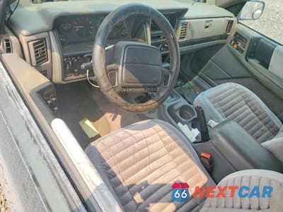 Zdjęcie 8 z 12 samochodu: 1995 JEEP GRAND CHEROKEE LAREDO VIN:1J4GZ58S4SC649397 - miniatura