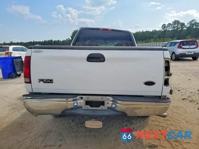 Zdjęcie 6 z 12 samochodu: 2000 FORD F150 VIN:1FTRX17W2YNB09545 - miniatura