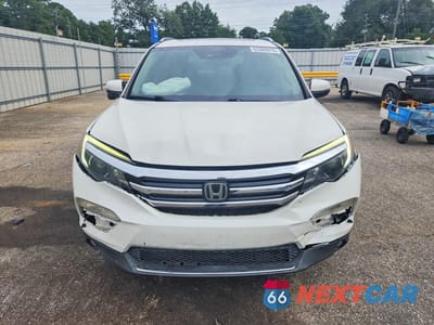 Piąte zdjęcie samochodu w środku: 2016 HONDA PILOT TOURING VIN:5FNYF5H95GB041186 - miniatura