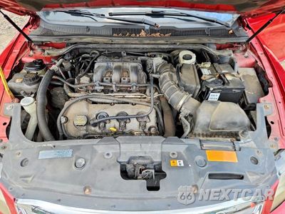 Zdjęcie 11 z 12 samochodu: 2010 FORD TAURUS SEL VIN:1FAHP2EW1AG160927 - miniatura