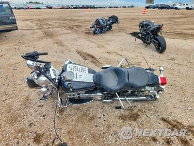 Trzecie zdjęcie samochodu z tyłu: 2014 HARLEY-DAVIDSON FLHR ROAD KING VIN:1HD1FBM13EB647018 - miniatura
