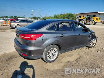 Trzecie zdjęcie samochodu z tyłu: 2018 FORD FOCUS SE VIN:1FADP3F27JL324334 - miniatura