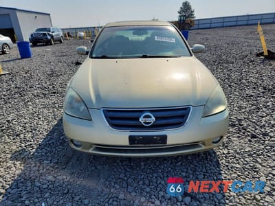 Piąte zdjęcie samochodu w środku: 2002 NISSAN ALTIMA 3.5 SE VIN:1N4BL11E72C129036 - miniatura