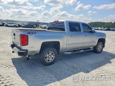 Trzecie zdjęcie samochodu z tyłu: 2018 CHEVROLET SILVERADO K1500 LT VIN:3GCUKREC1JG481554 - miniatura
