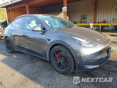 Czwarte zdjęcie samochodu z boku: 2022 TESLA MODEL Y VIN:7SAYGDEF1NF388872 - miniatura