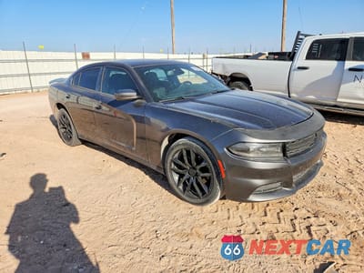 Czwarte zdjęcie samochodu z boku: 2015 DODGE CHARGER SE VIN:2C3CDXBG9FH751739 - miniatura
