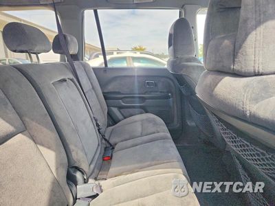 Zdjęcie 11 z 13 samochodu: 2004 HONDA PILOT EX VIN:2HKYF18494H575558 - miniatura