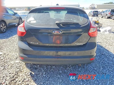 Zdjęcie 6 z 13 samochodu: 2013 FORD FOCUS TITANIUM VIN:1FADP3N23DL142166 - miniatura