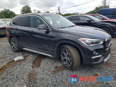 Czwarte zdjęcie samochodu z boku: 2017 BMW X1 XDRIVE28I VIN:WBXHT3Z34H4A55974 - miniatura