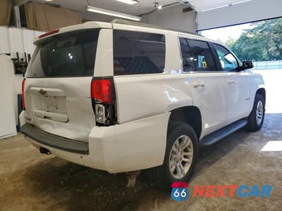 Trzecie zdjęcie samochodu z tyłu: 2019 CHEVROLET TAHOE K1500 LT VIN:1GNSKBKC5KR288951 - miniatura