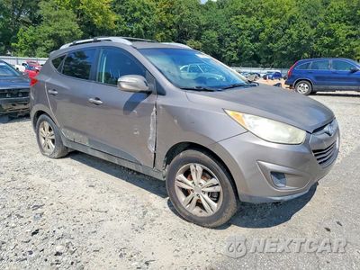 Czwarte zdjęcie samochodu z boku: 2012 HYUNDAI TUCSON GLS VIN:KM8JUCAC1CU491805 - miniatura