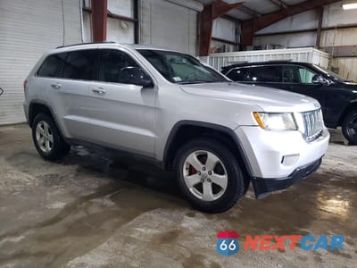 Czwarte zdjęcie samochodu z boku: 2011 JEEP GRAND CHEROKEE LAREDO VIN:1J4RR4GG2BC543157 - miniatura