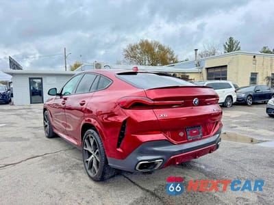 Trzecie zdjęcie samochodu z tyłu: 2021 BMW X6 M50I VIN:5UXCY8C09M9E51267 - miniatura