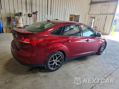 Trzecie zdjęcie samochodu z tyłu: 2017 FORD FOCUS SEL VIN:1FADP3H25HL312321 - miniatura