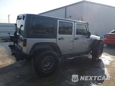 Trzecie zdjęcie samochodu z tyłu: 2015 JEEP WRANGLER UNLIMITED SPORT VIN:1C4BJWDG6FL652855 - miniatura