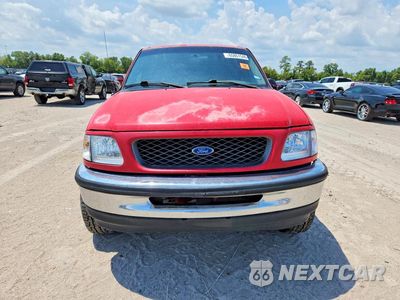 Piąte zdjęcie samochodu w środku: 1997 FORD F150 LARIAT VIN:1FTDX0760VKD19286 - miniatura
