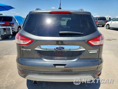 Zdjęcie 6 z 13 samochodu: 2016 FORD ESCAPE TITANIUM VIN:1FMCU0J98GUC10097 - miniatura