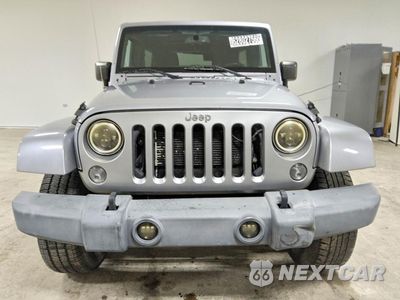 Piąte zdjęcie samochodu w środku: 2015 JEEP WRANGLER UNLIMITED SAHARA VIN:1C4BJWEG9FL649981 - miniatura