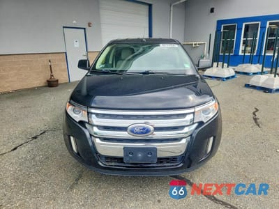 Piąte zdjęcie samochodu w środku: 2011 FORD EDGE VIN:2FMDK4JC4BBA62882 - miniatura