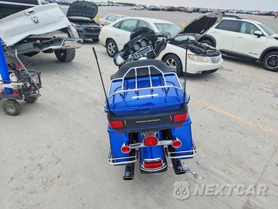 Czwarte zdjęcie samochodu z boku: 2010 HARLEY-DAVIDSON FLHTK VIN:1HD1KEM17AB656702 - miniatura