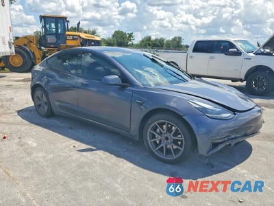 Czwarte zdjęcie samochodu z boku: 2022 TESLA MODEL 3 VIN:5YJ3E1EA4NF191243 - miniatura