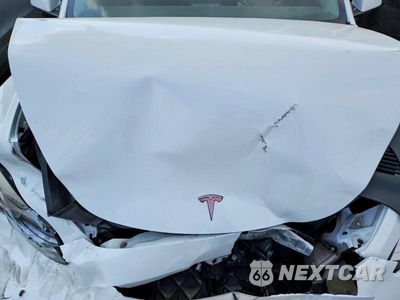 Zdjęcie 12 z 13 samochodu: 2022 TESLA MODEL Y VIN:7SAYGDEE9NF441065 - miniatura