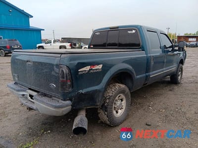 Trzecie zdjęcie samochodu z tyłu: 1999 FORD F250 SUPER DUTY VIN:1FTNW21F3XED75154 - miniatura
