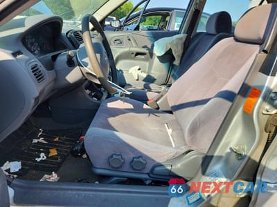 Zdjęcie 7 z 12 samochodu: 2000 MAZDA PROTEGE ES VIN:JM1BJ223XY0280045 - miniatura