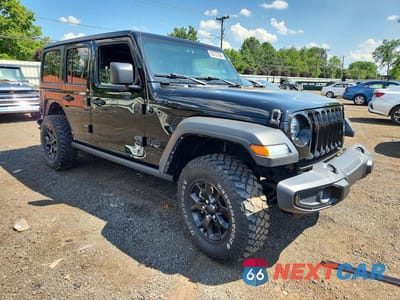 Czwarte zdjęcie samochodu z boku: 2022 JEEP WRANGLER UNLIMITED SPORT VIN:1C4HJXDG3NW139284 - miniatura