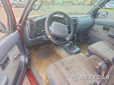 Zdjęcie 8 z 12 samochodu: 1998 TOYOTA TACOMA BASE VIN:4TAWM72NXWZ162959 - miniatura