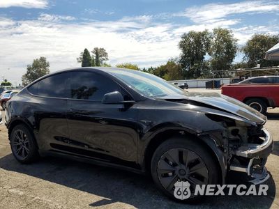 Czwarte zdjęcie samochodu z boku: 2024 TESLA MODEL Y VIN:7SAYGDEE7RF118624 - miniatura