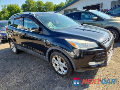 Czwarte zdjęcie samochodu z boku: 2014 FORD ESCAPE VIN:1FMCU9JX4EUC41301 - miniatura