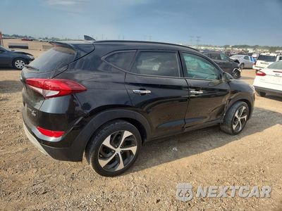Trzecie zdjęcie samochodu z tyłu: 2018 HYUNDAI TUCSON LIMITED VIN:KM8J3CA28JU834990 - miniatura