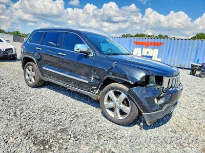 Czwarte zdjęcie samochodu z boku: 2013 JEEP GRAND CHEROKEE LIMITED VIN:1C4RJFBG4DC634028 - miniatura