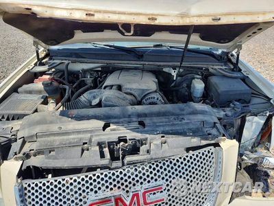 Zdjęcie 12 z 14 samochodu: 2011 GMC YUKON DENALI VIN:1GKS2EEF9BR375949 - miniatura