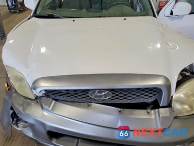 Zdjęcie 11 z 13 samochodu: 2004 HYUNDAI SANTA FE GLS VIN:KM8SC73D64U722283 - miniatura