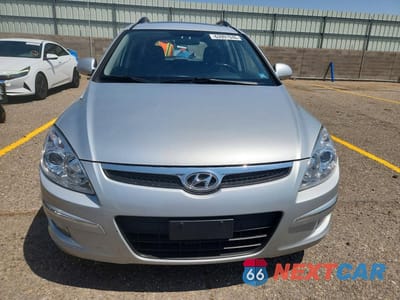 Piąte zdjęcie samochodu w środku: 2010 HYUNDAI ELANTRA TOURING SE VIN:KMHDC8AE0AU064465 - miniatura