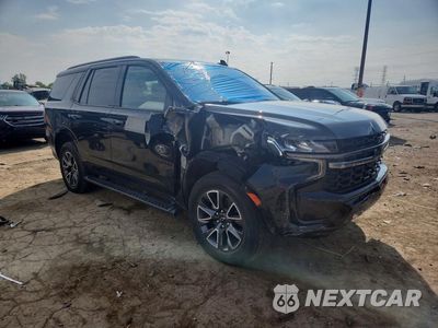 Czwarte zdjęcie samochodu z boku: 2021 CHEVROLET TAHOE K1500 Z71 VIN:1GNSKPKD9MR465445 - miniatura