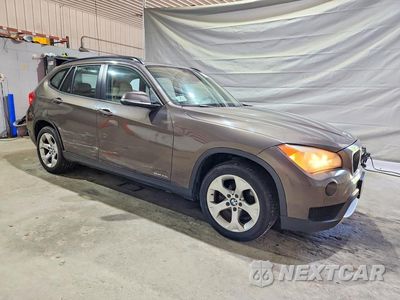 Czwarte zdjęcie samochodu z boku: 2013 BMW X1 SDRIVE28I VIN:WBAVM1C50DVW43297 - miniatura