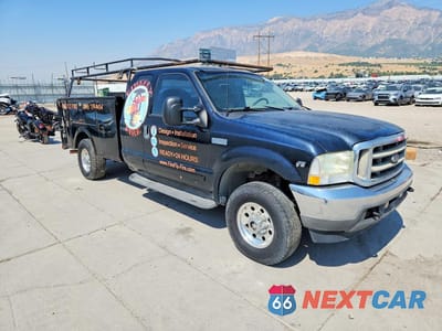 Czwarte zdjęcie samochodu z boku: 2002 FORD F250 SUPER DUTY VIN:1FTNX21L42EB29757 - miniatura