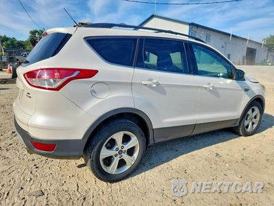 Trzecie zdjęcie samochodu z tyłu: 2014 FORD ESCAPE SE VIN:1FMCU9G93EUC40892 - miniatura